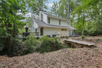 Nestled on a picturesque 1.16-acre lot in the highly on Hope Valley Country Club in North Carolina - for sale on GolfHomes.com, golf home, golf lot