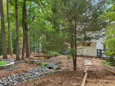 Nestled on a picturesque 1.16-acre lot in the highly on Hope Valley Country Club in North Carolina - for sale on GolfHomes.com, golf home, golf lot