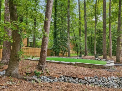 Nestled on a picturesque 1.16-acre lot in the highly on Hope Valley Country Club in North Carolina - for sale on GolfHomes.com, golf home, golf lot