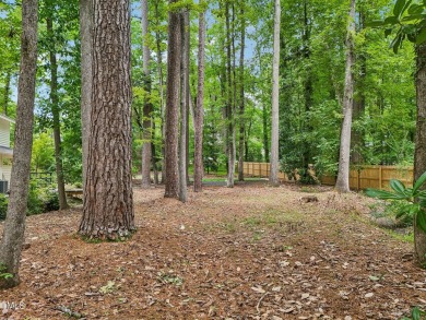 Nestled on a picturesque 1.16-acre lot in the highly on Hope Valley Country Club in North Carolina - for sale on GolfHomes.com, golf home, golf lot