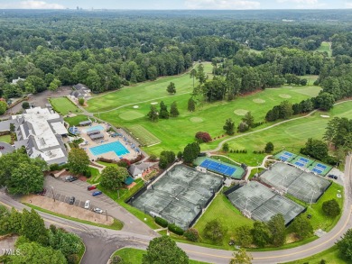 Nestled on a picturesque 1.16-acre lot in the highly on Hope Valley Country Club in North Carolina - for sale on GolfHomes.com, golf home, golf lot