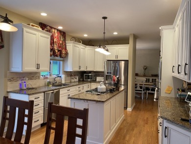 This really well maintained two story home on the first hole at on Bull Valley Golf Club in Illinois - for sale on GolfHomes.com, golf home, golf lot