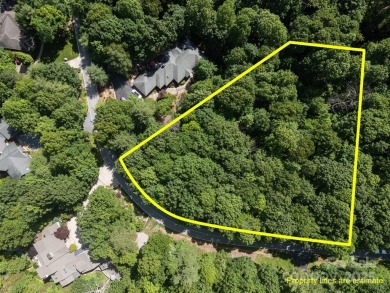 Nestled on 1.2 wooded acres in the gated Kenmure community, this on Kenmure Country Club in North Carolina - for sale on GolfHomes.com, golf home, golf lot
