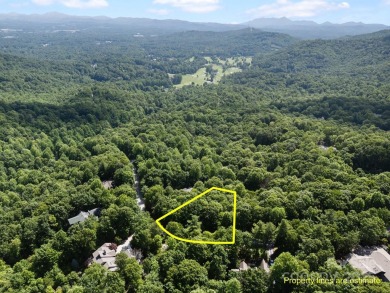 Nestled on 1.2 wooded acres in the gated Kenmure community, this on Kenmure Country Club in North Carolina - for sale on GolfHomes.com, golf home, golf lot