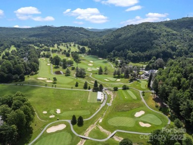 Nestled on 1.2 wooded acres in the gated Kenmure community, this on Kenmure Country Club in North Carolina - for sale on GolfHomes.com, golf home, golf lot