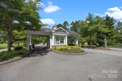 Nestled on 1.2 wooded acres in the gated Kenmure community, this on Kenmure Country Club in North Carolina - for sale on GolfHomes.com, golf home, golf lot