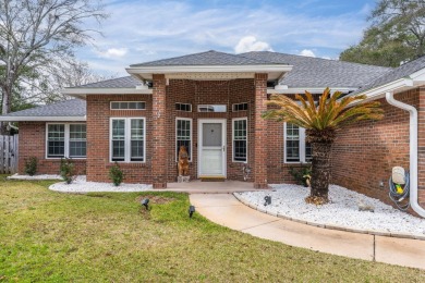 This well-maintained 4-bedroom, 2-bathroom home is located just on Fort Walton Beach Golf Course in Florida - for sale on GolfHomes.com, golf home, golf lot