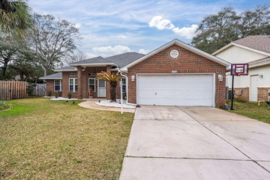 This well-maintained 4-bedroom, 2-bathroom home is located just on Fort Walton Beach Golf Course in Florida - for sale on GolfHomes.com, golf home, golf lot