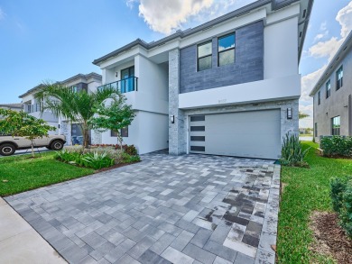 Experience the epitome of luxury living in this exquisite on Boca Raton Municipal Golf Course in Florida - for sale on GolfHomes.com, golf home, golf lot