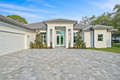 This newly built, one-story CBS home offers an exceptional on Jonathans Landing At Old Trail  in Florida - for sale on GolfHomes.com, golf home, golf lot