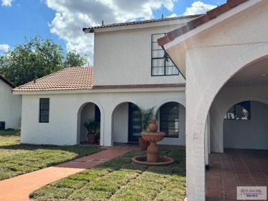 Welcome to this completely remodeled 4-bedroom, 4-bath home in on Rancho Viejo Resort and Country Club in Texas - for sale on GolfHomes.com, golf home, golf lot