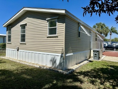 2019 Double-Wide in popular 55+ West Lakes of Boca Raton on Boca Grove Golf and Tennis in Florida - for sale on GolfHomes.com, golf home, golf lot