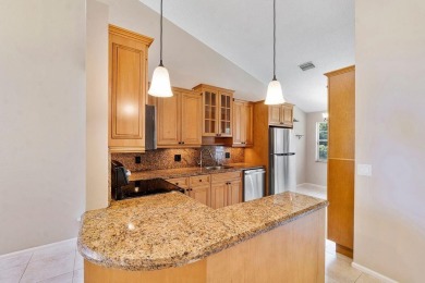 Stunning 3/2  upper corner unit with renovated open kitchen in on Bocaire Country Club in Florida - for sale on GolfHomes.com, golf home, golf lot