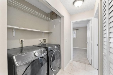 Stunning 3/2  upper corner unit with renovated open kitchen in on Bocaire Country Club in Florida - for sale on GolfHomes.com, golf home, golf lot