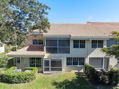 Stunning 3/2  upper corner unit with renovated open kitchen in on Bocaire Country Club in Florida - for sale on GolfHomes.com, golf home, golf lot