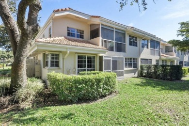 Stunning 3/2  upper corner unit with renovated open kitchen in on Bocaire Country Club in Florida - for sale on GolfHomes.com, golf home, golf lot