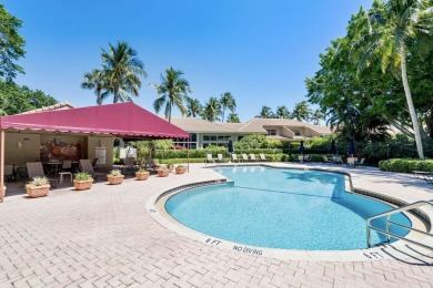 Stunning 3/2  upper corner unit with renovated open kitchen in on Bocaire Country Club in Florida - for sale on GolfHomes.com, golf home, golf lot