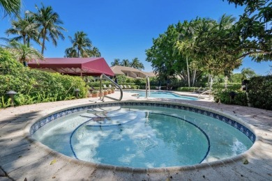 Stunning 3/2  upper corner unit with renovated open kitchen in on Bocaire Country Club in Florida - for sale on GolfHomes.com, golf home, golf lot