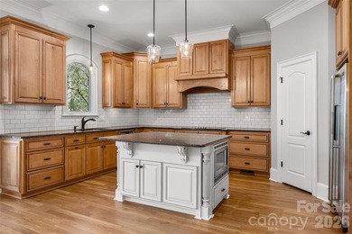 Stunning custom estate in the highly sought-after Springfield on Springfield Golf Course in South Carolina - for sale on GolfHomes.com, golf home, golf lot