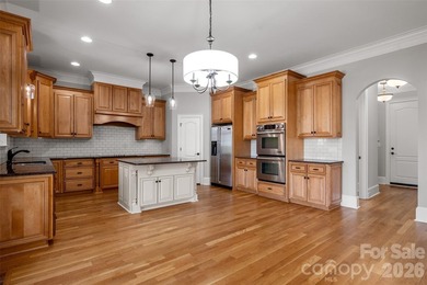 Stunning custom estate in the highly sought-after Springfield on Springfield Golf Course in South Carolina - for sale on GolfHomes.com, golf home, golf lot