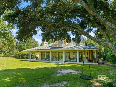 Discover this lovely Mediterranean-style home, conveniently on Lakewood Golf Club in Alabama - for sale on GolfHomes.com, golf home, golf lot