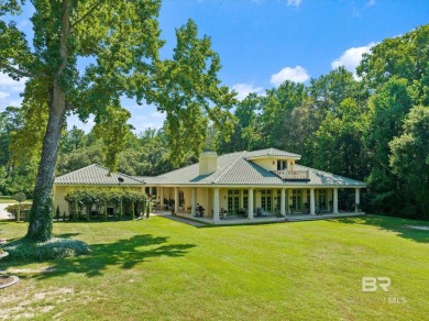 Discover this lovely Mediterranean-style home, conveniently on Lakewood Golf Club in Alabama - for sale on GolfHomes.com, golf home, golf lot