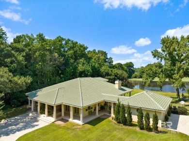 Discover this lovely Mediterranean-style home, conveniently on Lakewood Golf Club in Alabama - for sale on GolfHomes.com, golf home, golf lot