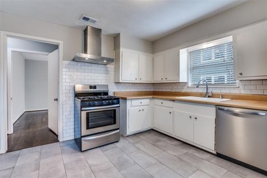 Fully leased duplex in the desirable Kings Highway neighborhood on Stevens Park Golf Course in Texas - for sale on GolfHomes.com, golf home, golf lot