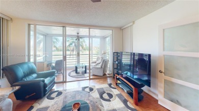 see Matterport Virt tour! Remarkable views to the 17th fairway on Palm-Aire Country Club and Resort - The Oaks in Florida - for sale on GolfHomes.com, golf home, golf lot
