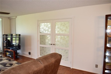 see Matterport Virt tour! Remarkable views to the 17th fairway on Palm-Aire Country Club and Resort - The Oaks in Florida - for sale on GolfHomes.com, golf home, golf lot