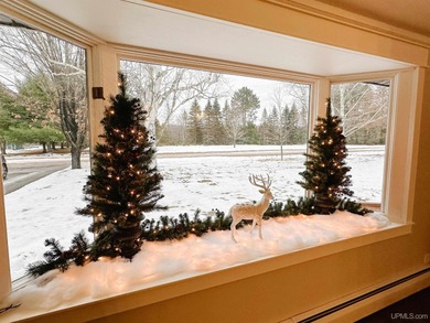 Welcome to 201 Cedar Ln., a charming ranch-style home perfectly on Gentzs Homestead Golf Course in Michigan - for sale on GolfHomes.com, golf home, golf lot