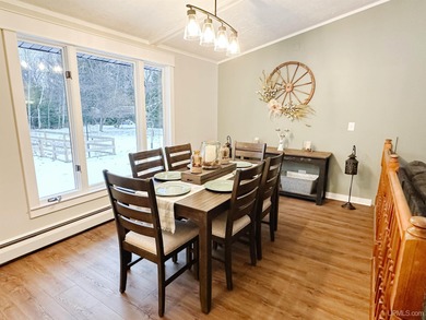 Welcome to 201 Cedar Ln., a charming ranch-style home perfectly on Gentzs Homestead Golf Course in Michigan - for sale on GolfHomes.com, golf home, golf lot