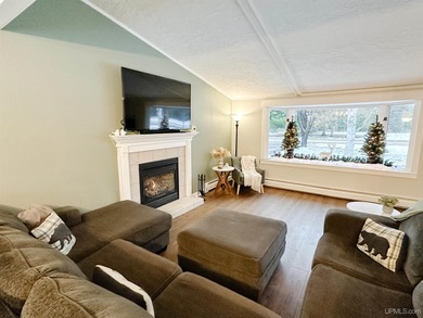 Welcome to 201 Cedar Ln., a charming ranch-style home perfectly on Gentzs Homestead Golf Course in Michigan - for sale on GolfHomes.com, golf home, golf lot