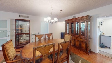 see Matterport Virt tour! Remarkable views to the 17th fairway on Palm-Aire Country Club and Resort - The Oaks in Florida - for sale on GolfHomes.com, golf home, golf lot