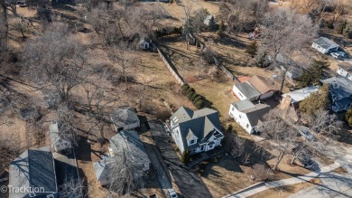 This inviting three bedroom, two and a half bath home is on Downers Grove Golf Club in Illinois - for sale on GolfHomes.com, golf home, golf lot