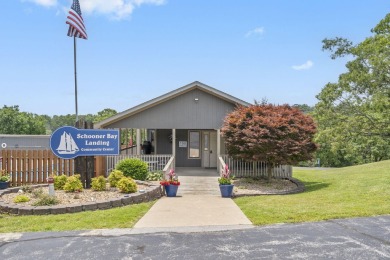 It's Summertime Today! This 2-bedroom, 2-bath condo at Schooner on Kimberling City Golf Club in Missouri - for sale on GolfHomes.com, golf home, golf lot