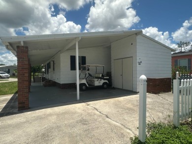Discover incredible potential in this fully furnished home, ripe on Lake Fairways Country Club in Florida - for sale on GolfHomes.com, golf home, golf lot