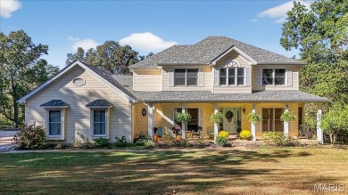 Welcome to 5600 Forest Dr., a stunning 5 bed, 3.5 bath home on 3 on Raintree Country Club in Missouri - for sale on GolfHomes.com, golf home, golf lot