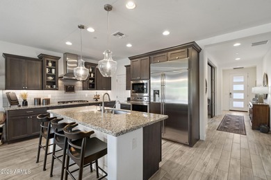 Beautifully upgraded and highly coveted this Acacia model at on Vista Verde Golf Course in Arizona - for sale on GolfHomes.com, golf home, golf lot
