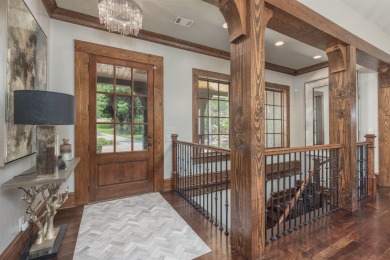 Upscale custom home located in Angel Pond. This home offers on Reynolds Lake Oconee - The Oconee in Georgia - for sale on GolfHomes.com, golf home, golf lot