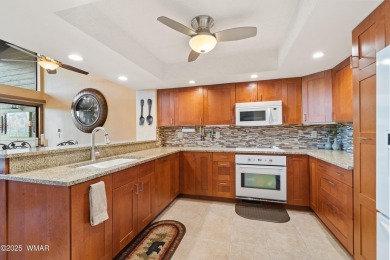 Experience luxury living in this stunning townhouse located on on Pinetop Lakes Golf and Country Club in Arizona - for sale on GolfHomes.com, golf home, golf lot