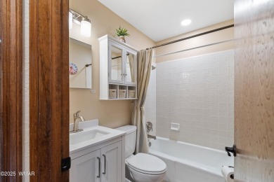Experience luxury living in this stunning townhouse located on on Pinetop Lakes Golf and Country Club in Arizona - for sale on GolfHomes.com, golf home, golf lot
