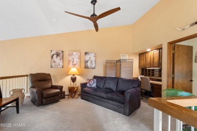 Experience luxury living in this stunning townhouse located on on Pinetop Lakes Golf and Country Club in Arizona - for sale on GolfHomes.com, golf home, golf lot