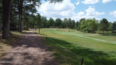 Experience luxury living in this stunning townhouse located on on Pinetop Lakes Golf and Country Club in Arizona - for sale on GolfHomes.com, golf home, golf lot