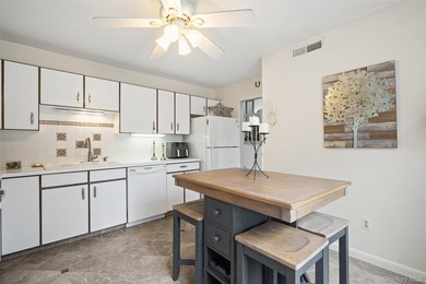 Live the Heritage Hills lifestyle in this beautiful Armonk model on Somers Pointe Golf Club - West Hill in New York - for sale on GolfHomes.com, golf home, golf lot