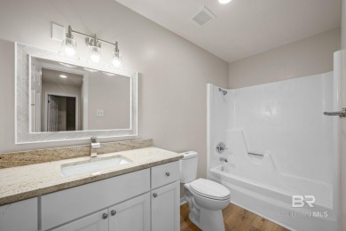 This beautifully updated 4-bedroom, 3-bath, 2,618 sq. ft on Lake Forest Yacht and Country Club in Alabama - for sale on GolfHomes.com, golf home, golf lot