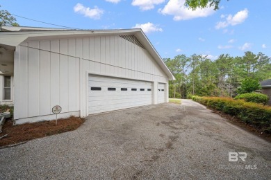 This beautifully updated 4-bedroom, 3-bath, 2,618 sq. ft on Lake Forest Yacht and Country Club in Alabama - for sale on GolfHomes.com, golf home, golf lot