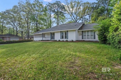 This beautifully updated 4-bedroom, 3-bath, 2,618 sq. ft on Lake Forest Yacht and Country Club in Alabama - for sale on GolfHomes.com, golf home, golf lot