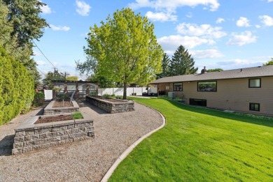 Stunning VIEW home boasts one of the best LOCATIONS in the on Liberty Lake Golf Club in Washington - for sale on GolfHomes.com, golf home, golf lot