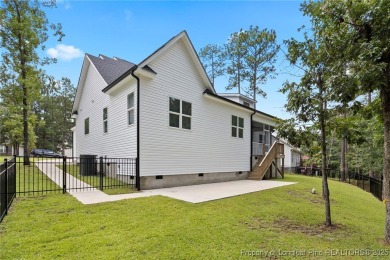 You do not want to miss out on this gorgeous custom-built home on Carolina Lakes Country Club in North Carolina - for sale on GolfHomes.com, golf home, golf lot